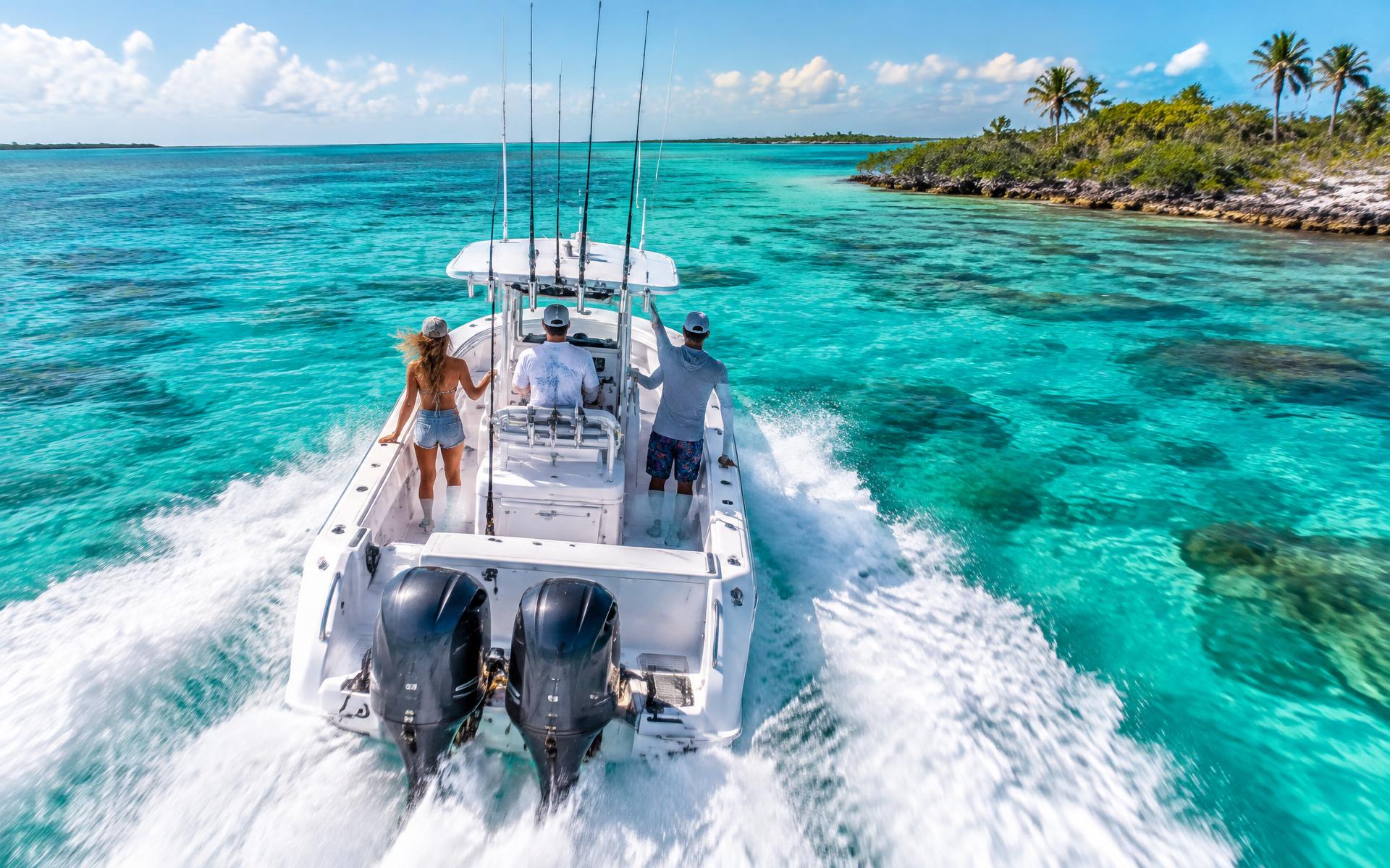 A center-console boat speeding across clear Florida Keys water